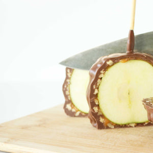 Caramel Apple with Nuts Sliced in Half