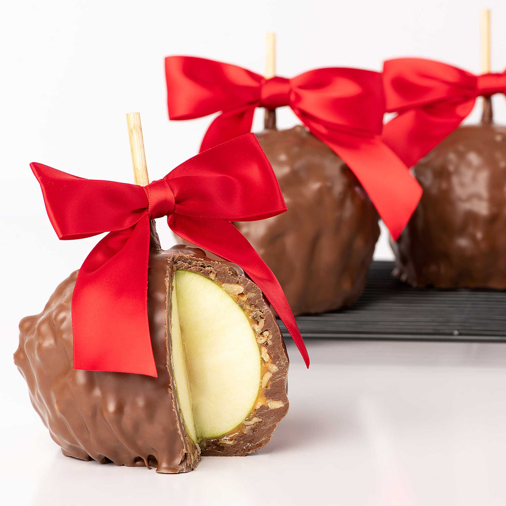 4 Pack of Colassal Caramel Apples with Nuts