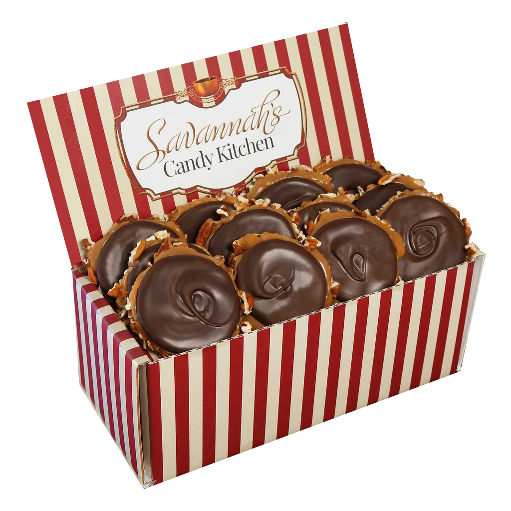 12 Dark Chocolate Turtles in our Signature Striped Box